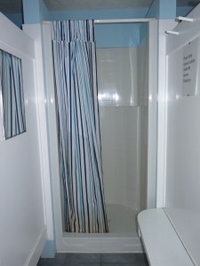One of the shower stalls in the men's washroom